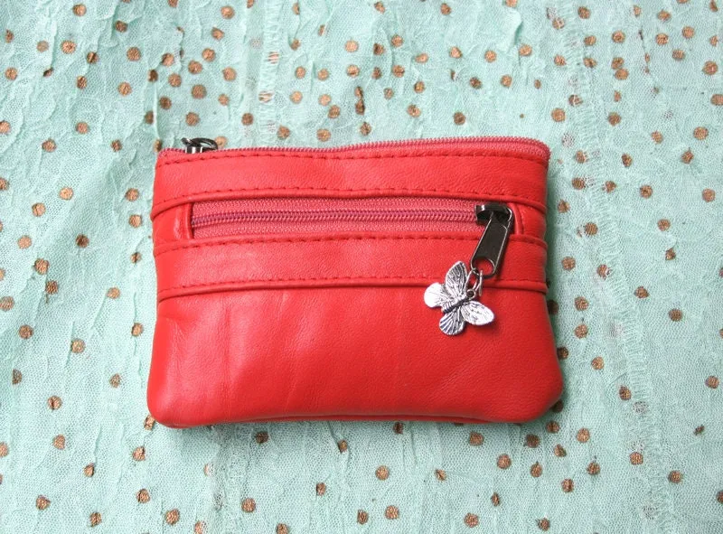 small purse in genuine leather. CORAL RED purse for cards, coins and bills, 3 zippers and a metallic butterfly charm. Soft red leather